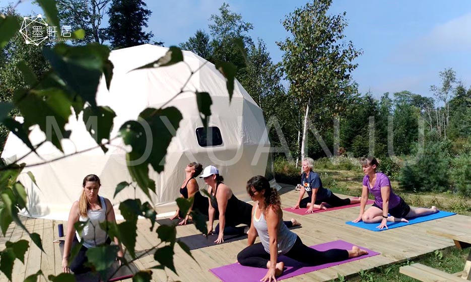 A Woman Does Yoga On The Terrace In A Geo Dome Glamping Tent. Stock Photo,  Picture and Royalty Free Image. Image 190093431.